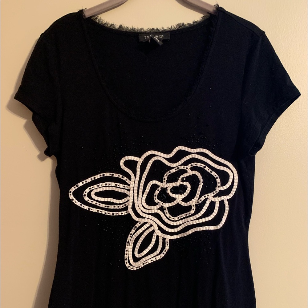 WHBM Size Med black short-sleeves tee w/ floral pattern & neckline detail.